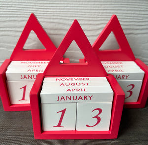 Delta wooden block calendar.